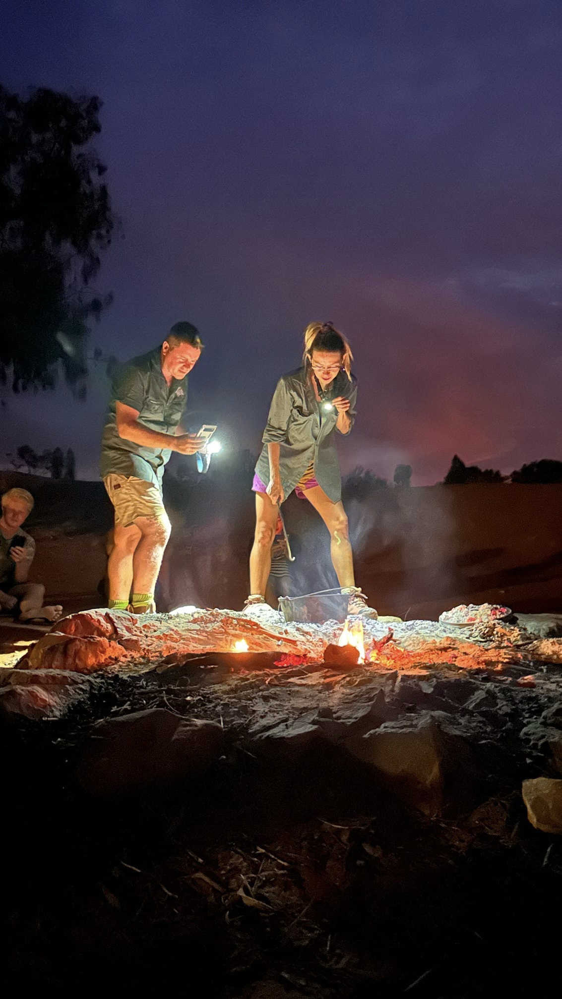 Tour Guides Phil & CJ Cooking Dinner on the Coals