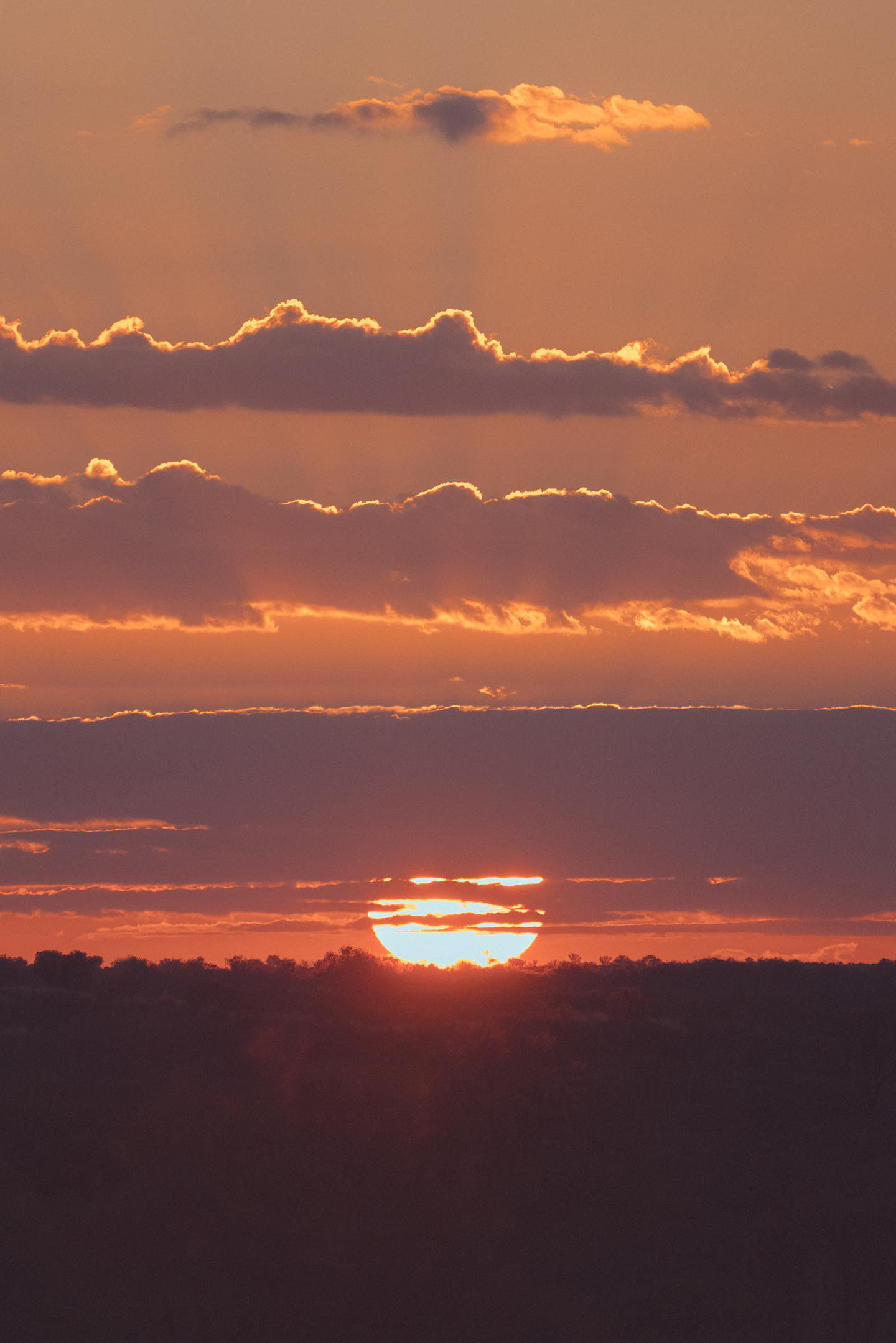 Witness the spectacular sunset illuminating the Australian Outback skies, a magical moment on any Mulgas Adventures tour. Photo credit: Nastasia Klopp. Instagram: @nastasiaklopp