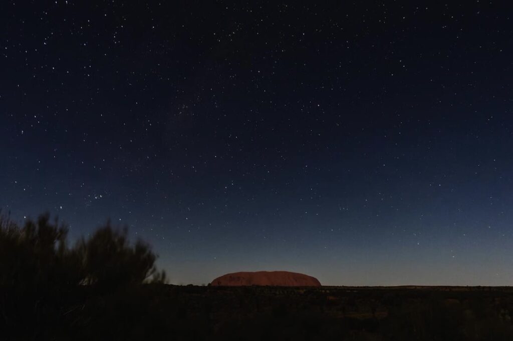 Starry night sky over Uluru in Central Australia