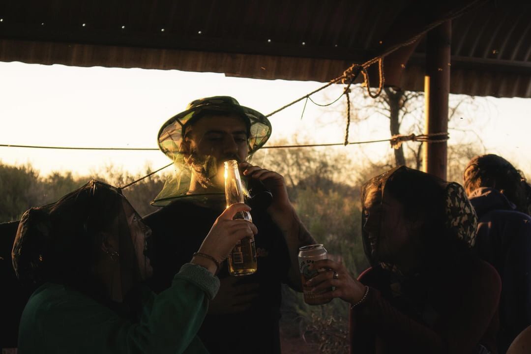 Catching the golden hour with good company and a refreshing drink. Photo Credit: Aled Rowlands. Instagram: @photosbyaled